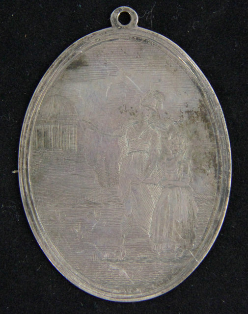 An oval medallion etched two