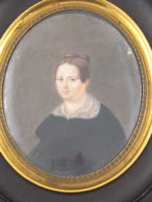 An oval portrait miniature on ivory