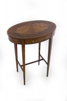An oval satinwood and yew wood side