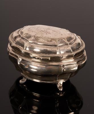 An oval silver tea caddy,