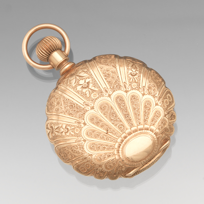 An Oversized Gold Pocket Watch by
