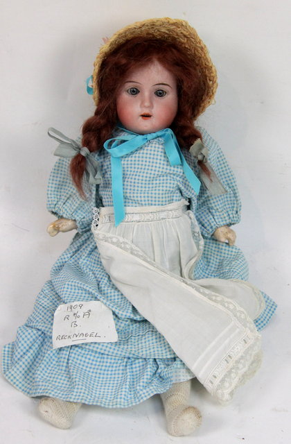 An R 4/0 a bisque headed doll