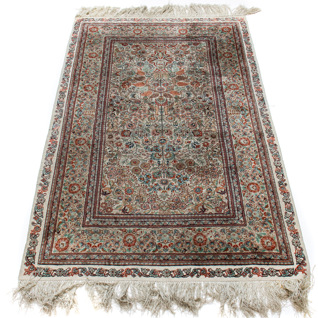 AN TURKISH PART SILK CARPET WITH