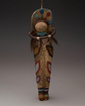 AN UMATILLA HIDE DOLL AND CRAD