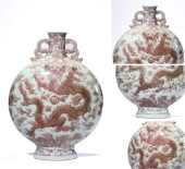 AN UNDERGLAZE-RED 'DRAGON' MOO
