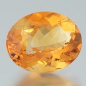 AN UNMOUNTED ORANGE OVAL CITRI