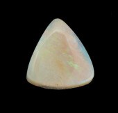 An Unmounted White Opal Caboch