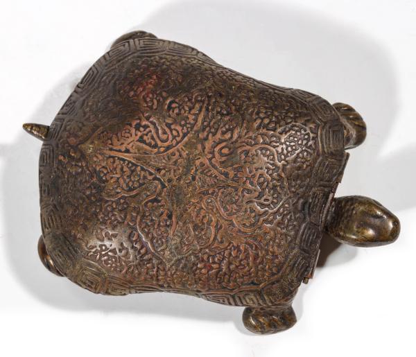 AN UNUSUAL BRASS TURTLE MATCH