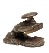 AN UNUSUAL FIGURAL TOAD IRON S