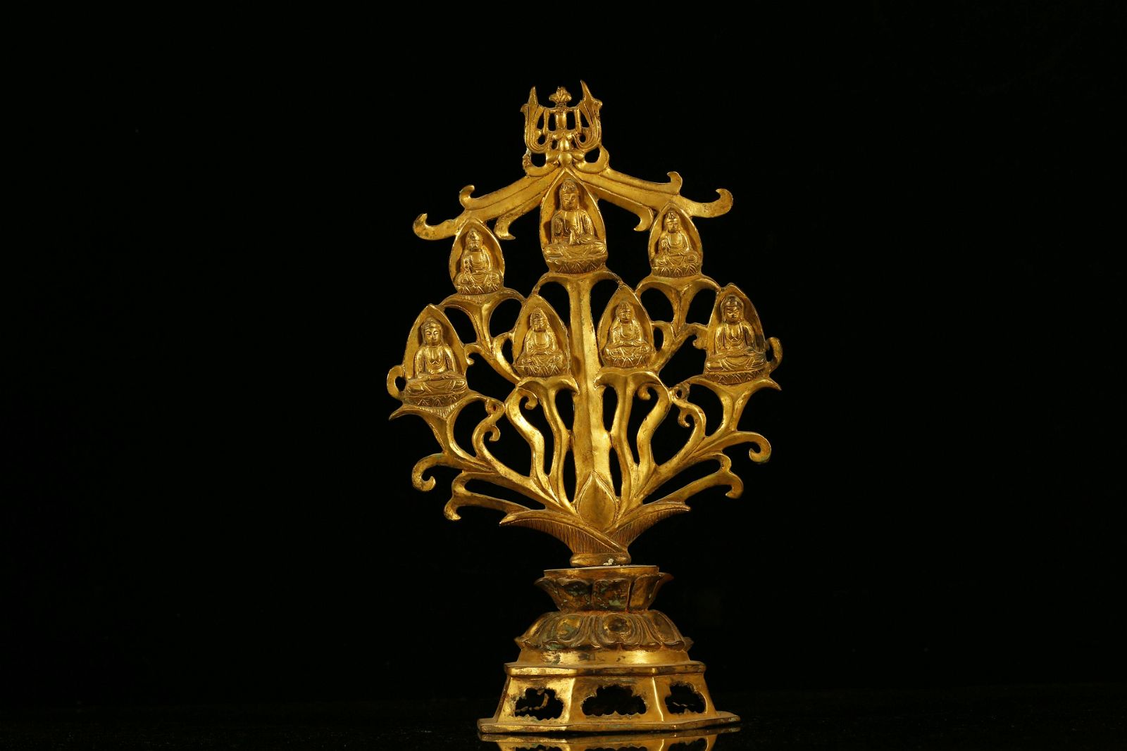 AN UNUSUAL GILT-BRONZE 'BUDDHA'