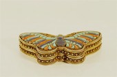 AN UNUSUAL GILT-SILVER 'BUTTER