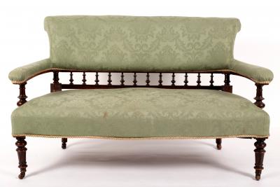 An upholstered settee with