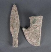 Ancient bronze axe head and sp