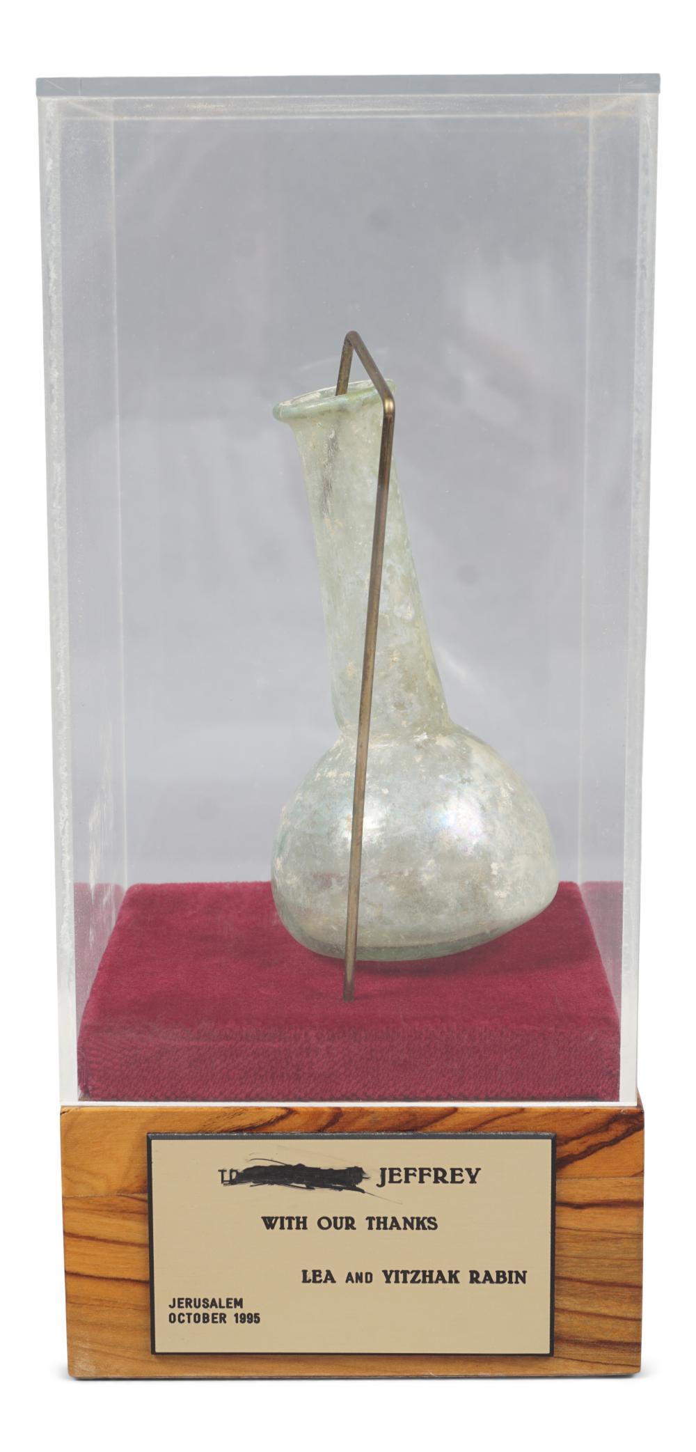 ANCIENT GLASS FLASK PRESENTED BY