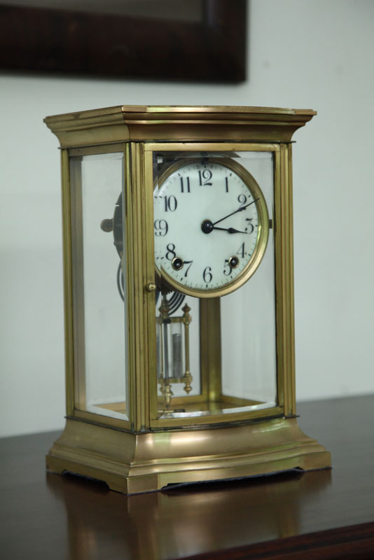 ANNIVERSARY CLOCK. Brass case
