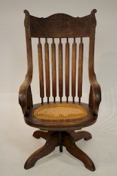 ANTIQUE AMERICAN OAK SWIVEL AR