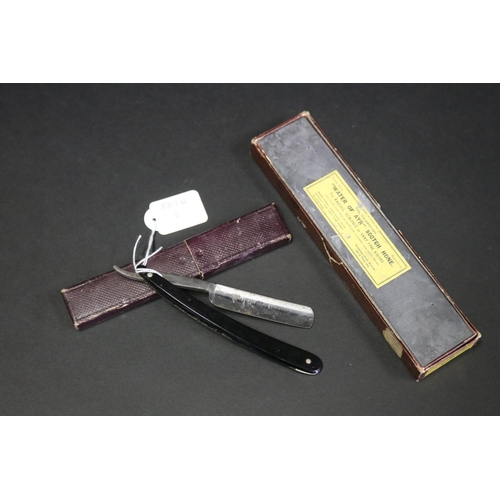 Antique boxed cut throat razor,
