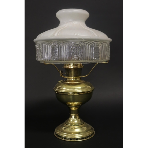 Antique brass oil lamp with glass