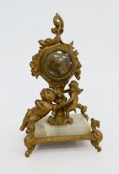 ANTIQUE BRASS & ONYX CHERUB DE