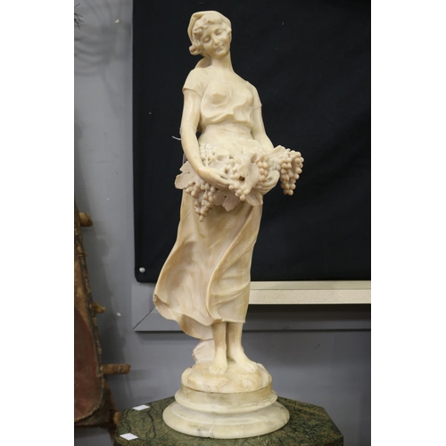 Antique carved alabaster figure