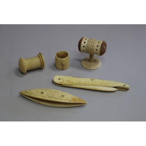 Antique carved ivory items to