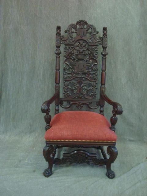 Antique Carved Mahogany Arm