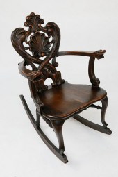 ANTIQUE CARVED SOLID OAK ROCKI