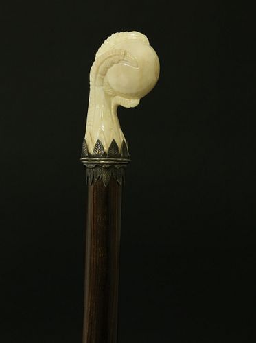 ANTIQUE CARVED TALON CLUTCHING BALL