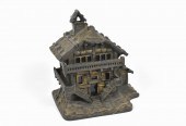 ANTIQUE CAST IRON CHALET CANDL