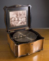 ANTIQUE DISC-PLAYING MUSIC BOX