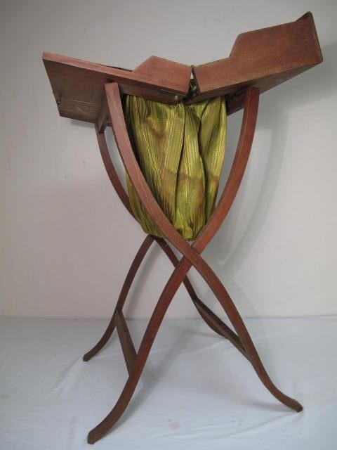 Antique folding sewing stand.