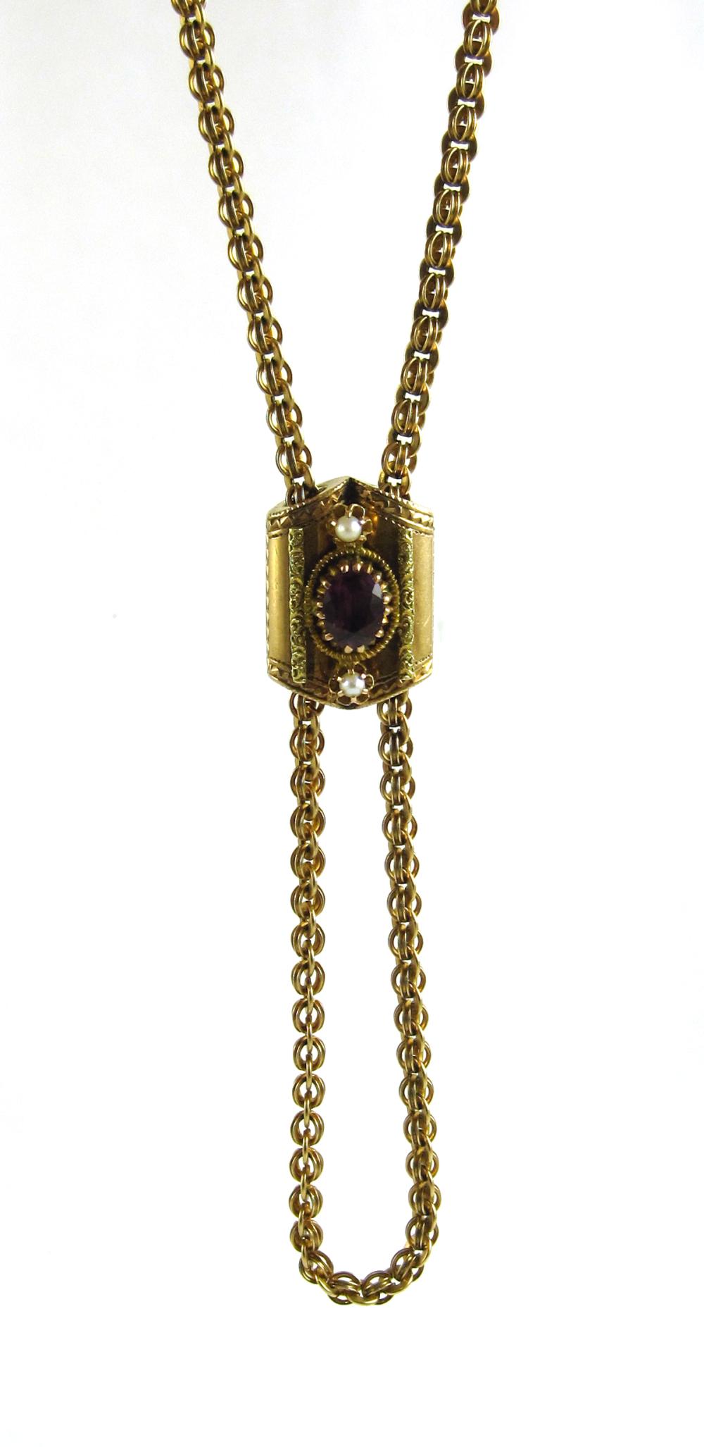 ANTIQUE FOURTEEN KARAT GOLD SLIDE