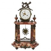 ANTIQUE FRENCH CLOCK ON RED MA