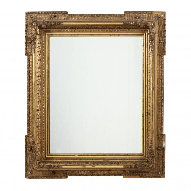 ANTIQUE GILT FLORAL MOTIF MIRROR 