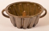 ANTIQUE GREEN GLAZED EARTHENWA