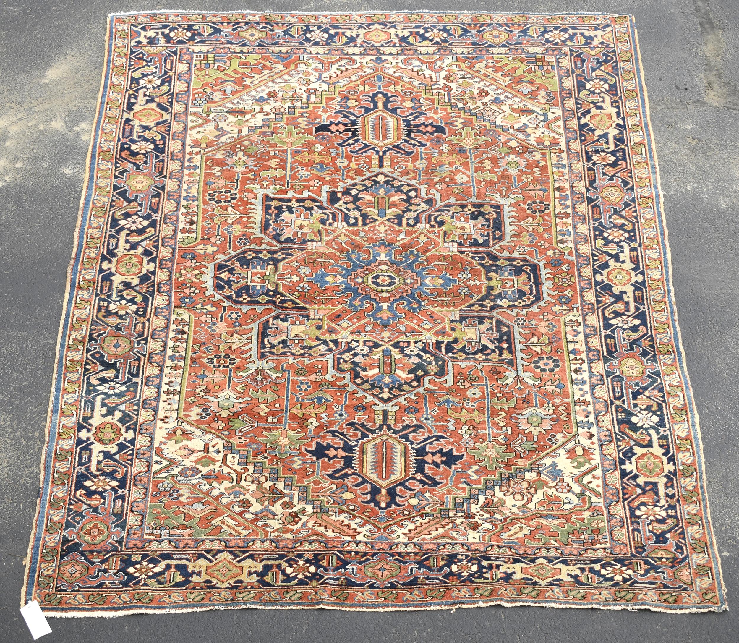 ANTIQUE HERIZ ROOM SIZE RUG.
