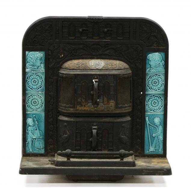 ANTIQUE IRON COAL FIREPLACE WITH