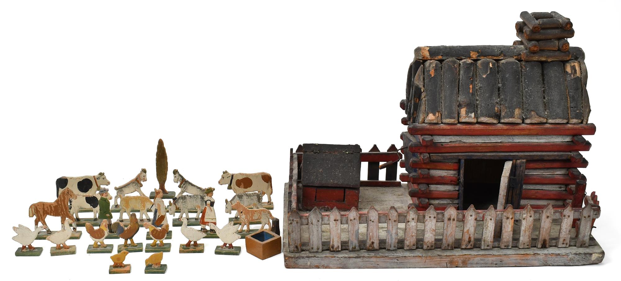ANTIQUE LOG CABIN WITH ANIMALS. A