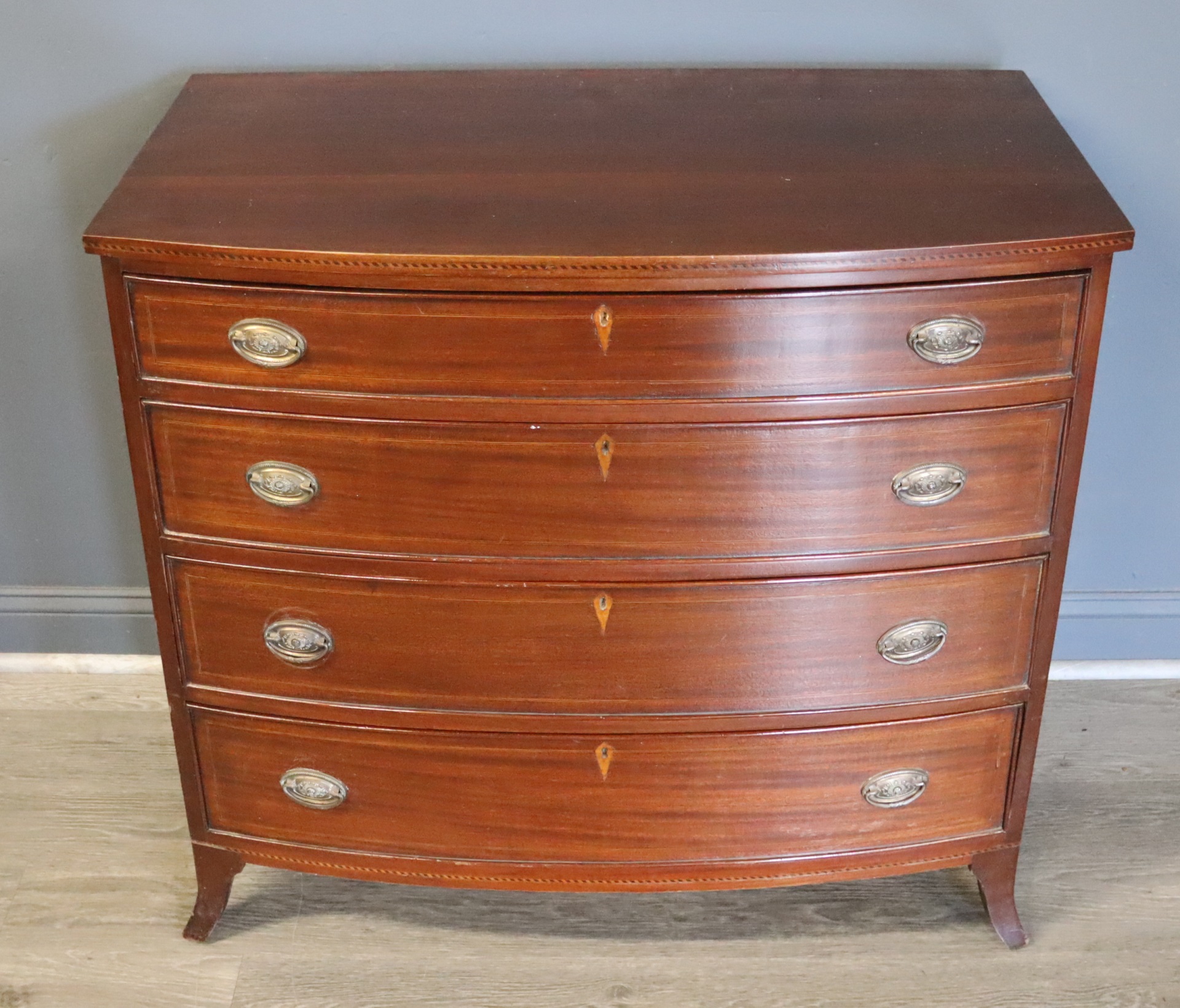 ANTIQUE MAHOGANY BOW FRONT CHEST.