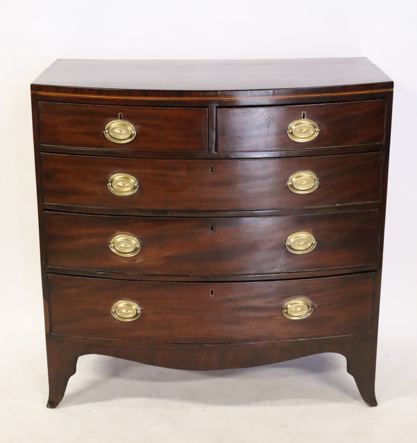 ANTIQUE MAHOGANY BOW FRONT CHEST.