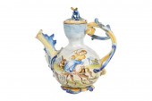 ANTIQUE MAJOLICA EWERwith brow