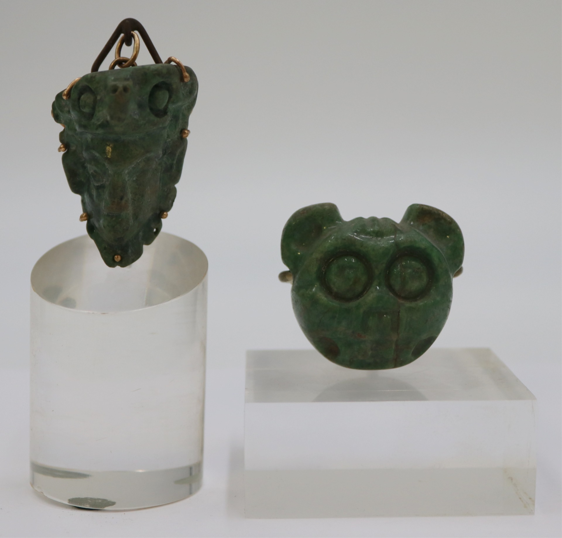 ANTIQUE MAYAN CARVED JADE PENDANTS.