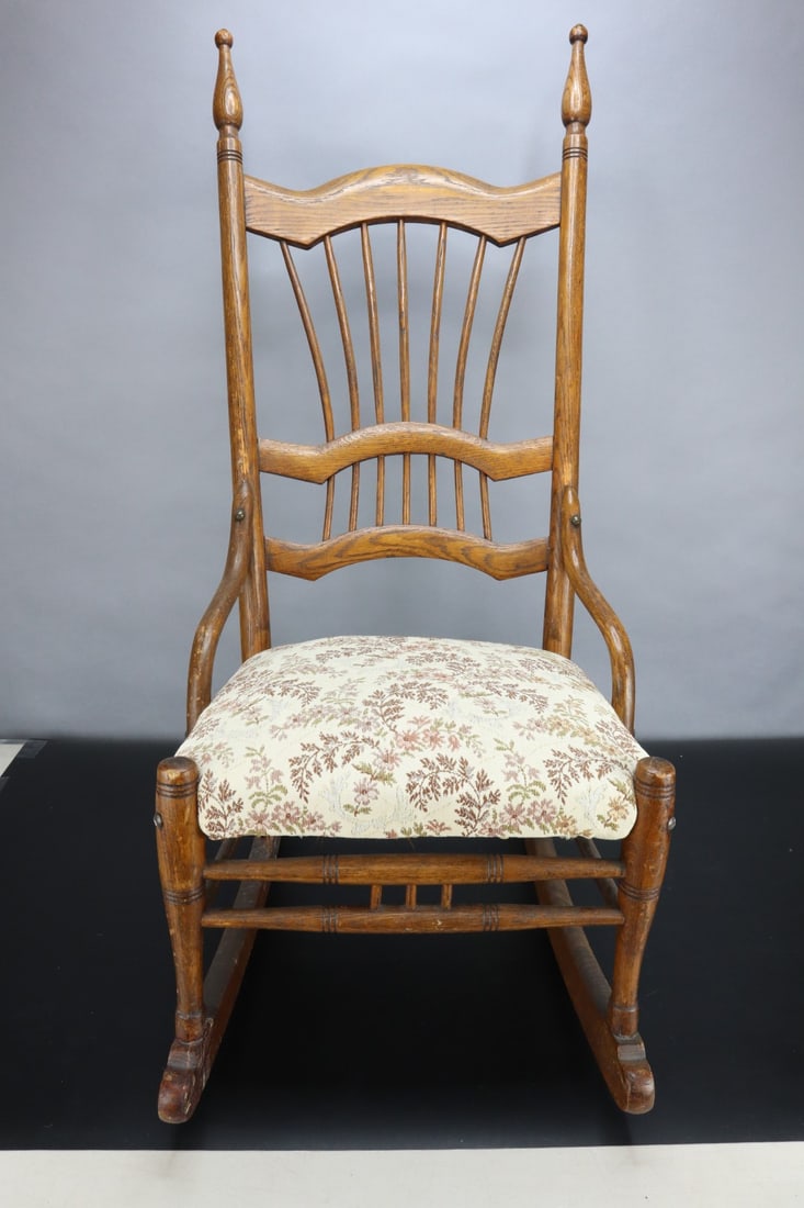ANTIQUE OAK CHILD'S ROCKING CHAIR