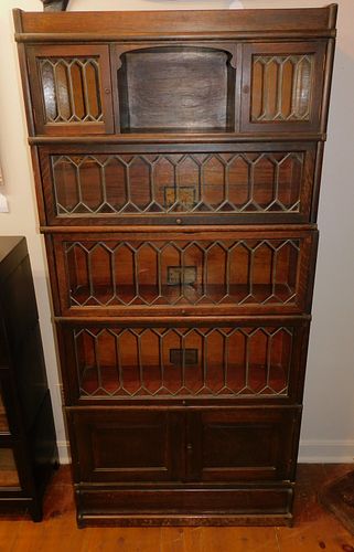 ANTIQUE OAK LEADED GLASS STACK