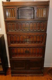 ANTIQUE OAK LEADED GLASS STACK