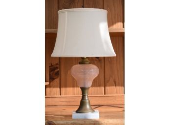 Antique oil lamp with swirled peach