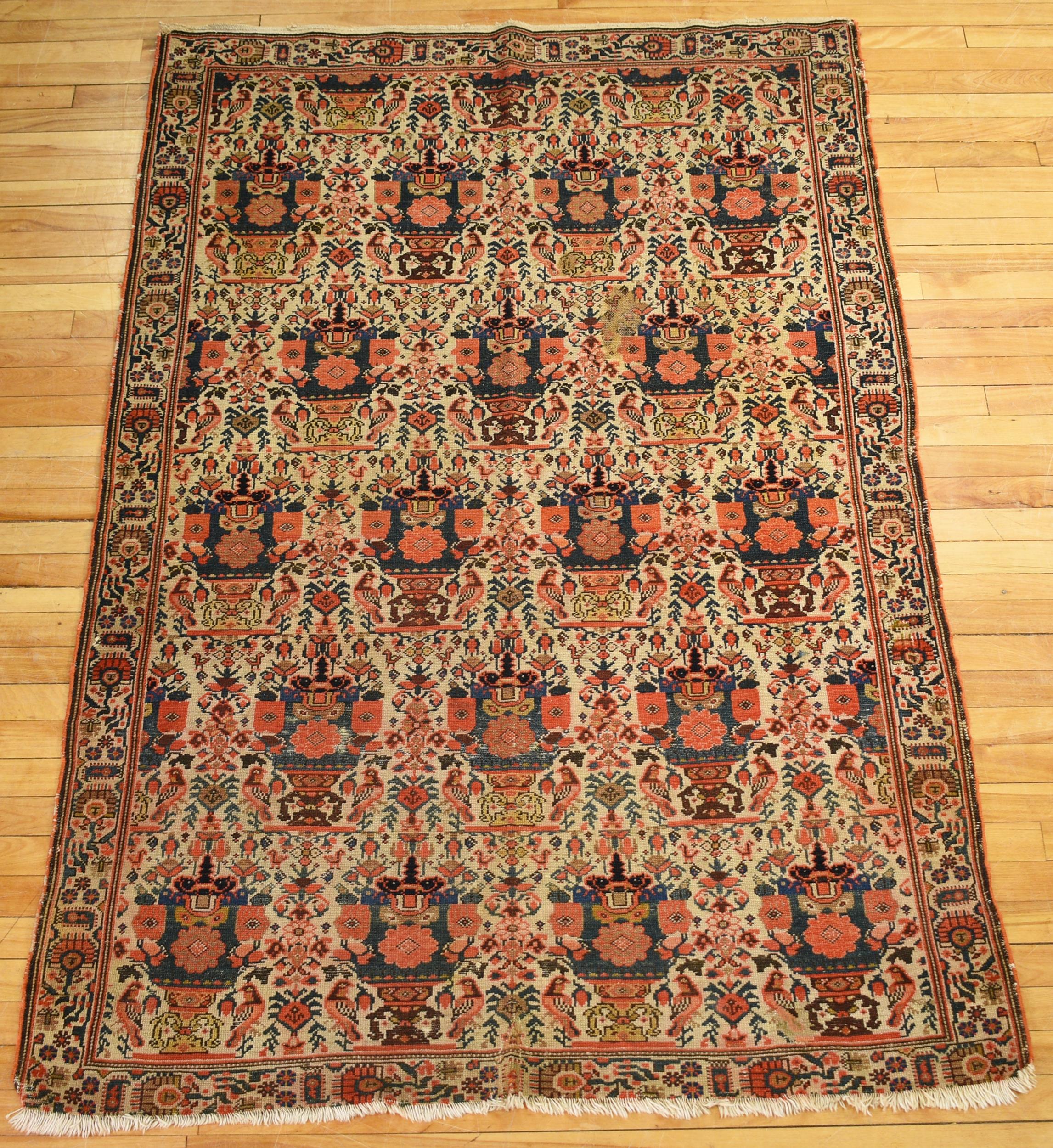 ANTIQUE ORIENTAL SCATTER RUG. A