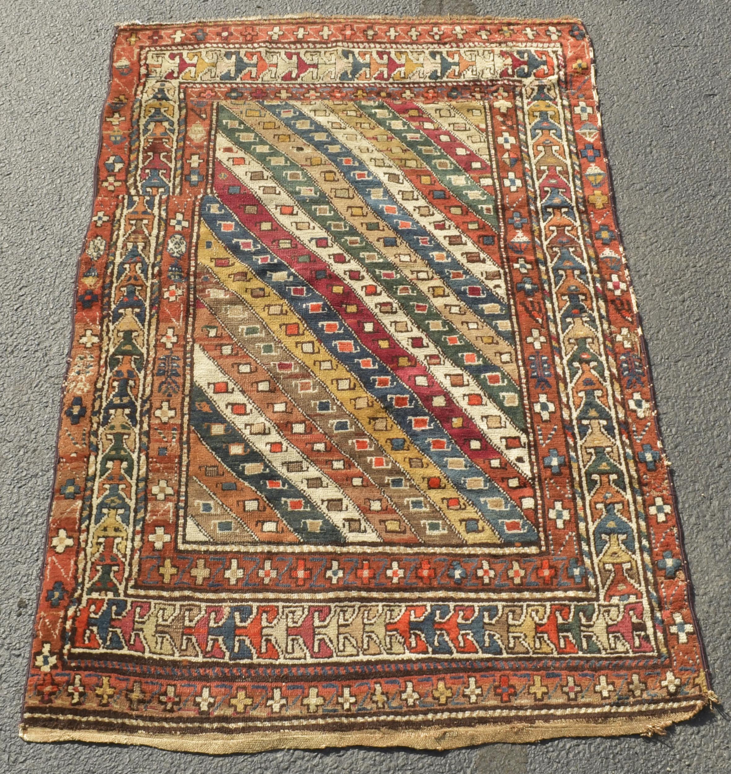 ANTIQUE ORIENTAL SCATTER RUG.