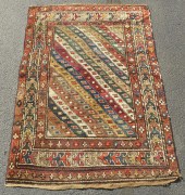 ANTIQUE ORIENTAL SCATTER RUG.