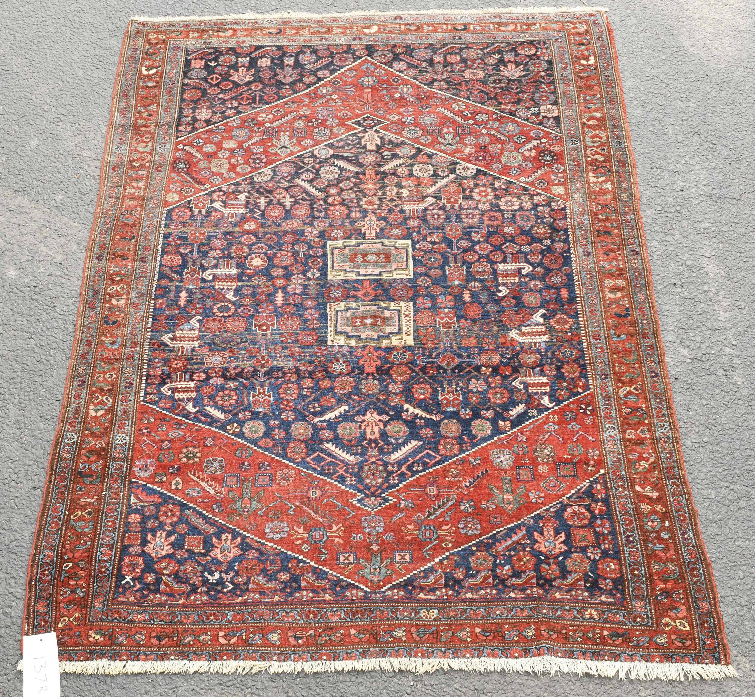 ANTIQUE ORIENTAL SCATTER RUG.